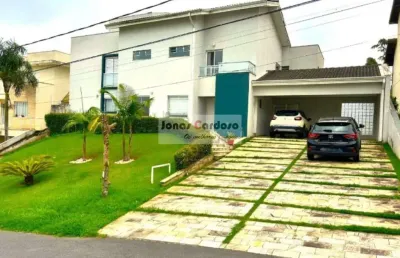 Casa a venda no condomínio aruã lagos ii em mogi das cruzes, com 300m² de construção em 2 lotes e um amplo quintal. por r$2.400.000,00