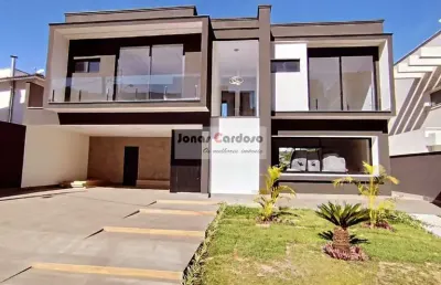 Imperdível casa à venda no jardim das cerejeiras em arujá. com 4 quartos, 4 suítes, 3 salas, 5 banheiros, 5 vagas, 240m². confira!