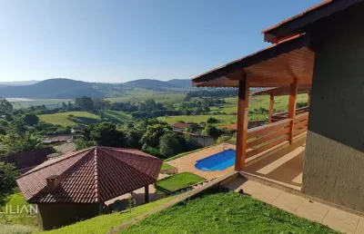 'espetacular casa em condomínio fechado: 4 suítes, área gourmet, piscina e vista inigualável!'