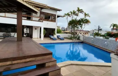 Casa de luxo à venda em condomínio exclusivo no itaigara: 5 quartos, 5 suítes, 3 salas, 4 banheiros, 6 vagas, 687m² de área!