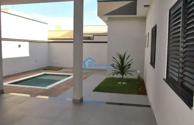 Casa terrea com piscina e jardim em condominio fechado