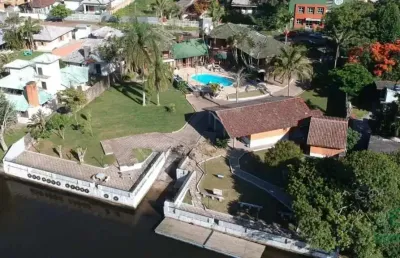 Espetacular casa de cinema, beira do rio em torres - ca2375