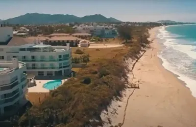 Pé na areia, dormir ao som do mar saída esclus. p praia