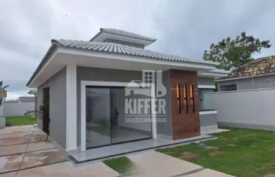 Casa linear à venda em itaipuaçu jardim atlântico leste 480m² de terreno 132,23m² de área construída  3 quartos 2 suítes piscina com cascata