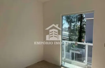 Casa em condomínio com dois dormitórios e vaga de garagem em tiradentes