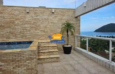 Cobertura duplex à venda no centro de bertioga com vista para o mar e para a serra