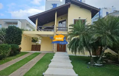 Luxuosa casa de condomínio à venda em bertioga-sp, no bairro maitinga: 4 suítes, 3 salas, 6 banheiros, 5 vagas de garagem, 262,41 m² de área.