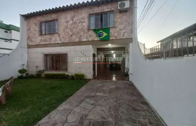 Casa em condomínio fechado com 4 quartos à venda na Vila Ponta Porã, Cachoeirinha 