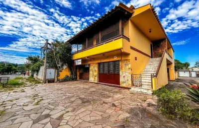Casa de 3 dormitórios, 1 suíte, garagem fechada, churrasqueira, no bairro cavalhada porto alegre/rs