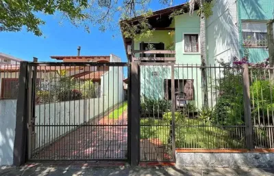 Casa com 3 dormitórios, sendo 1 suíte, vaga para 4 carros, no bairro santana