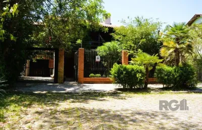 Magnífica mansão anos 90 a beira do guaíba na zona sul de porto alegre!