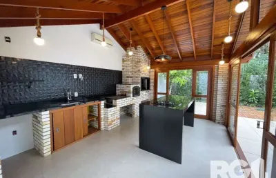 Casa com 4 quartos à venda na Rua Adão Pinheiro da Silva, --, Ipanema, Porto Alegre