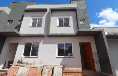 Casa em condomínio fechado com 2 quartos à venda na Rua Miguel Ascoleze, --, Vila Nova, Porto Alegre