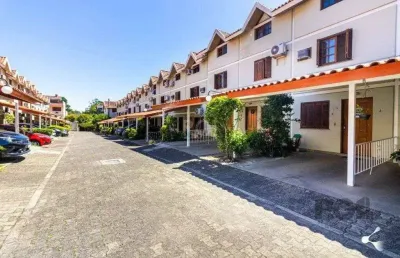 Casa em condominio no bairro tristeza de 3 dormitórios e vaga