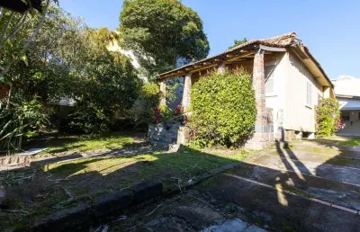 Casa de alvenaria com 104,37m² 3 dormitórios sendo 1 suíte, 2 vagas cobertas