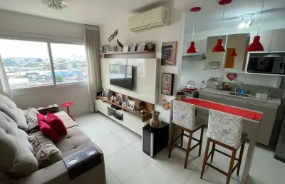 Apartamento de 2 dormitórios, suíte, churrasqueira e 2 vagas.