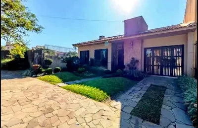 Casa com 3 quartos à venda na Rua Ítalo Brutto, --, Espírito Santo, Porto Alegre