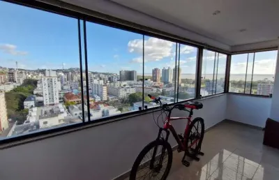 Apartamento impecável de frente no menino deus, 103,00 m² de área útil, 2 dormitórios, varanda integrada com churrasqueira, 2 garagens