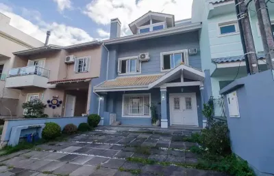 Casa em condomínio fechado com 3 quartos à venda na Rua Corticeira, --, Hípica, Porto Alegre