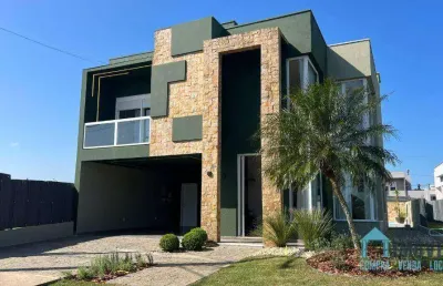 Casa de alto padrão, por r$ 1.680.000 - condomínio marítimo - tramandaí/rs