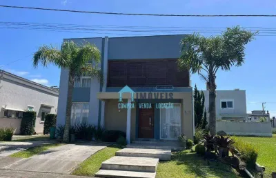 Sobrado com 5 dormitórios à venda, 272 m² por r$ 2.195.000 - condomínio marítimo - tramandaí/rs