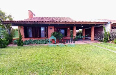 Béla casa com terreno amplo de 950m² com grande potencial para ponto comercial, de 950.000 por 860,000 - guia corrente - imbé/rs