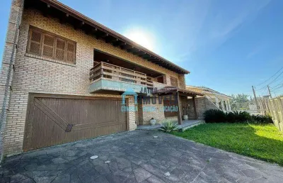 Casa com excelente padrão construtivo em avenida central, à venda, por r$ 690.000 - centro - balneário pinhal/rs