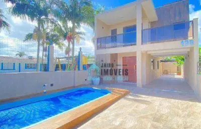 Sobrado com 3 suítes à venda, 137 m² por r$ 648.000 - centro - imbé/rs