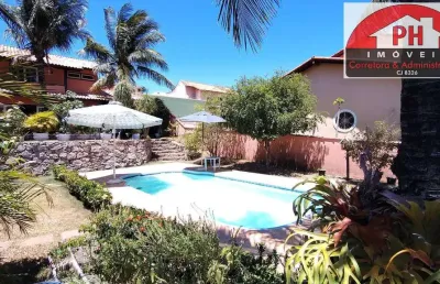 Maravilhosa casa com piscina em condomínio fechado em praia linda