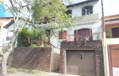 Casa em condomínio fechado com 4 quartos à venda na rua nero josé da silva filho, 205, partenon, porto alegre, 260 m2 por r$ 650.000