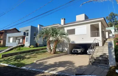 Casa em condomínio fechado com 3 quartos à venda na estrada capitão gentil machado de godoy, 4500, vila elsa, viamão, 254 m2 por r$ 1.450.000
