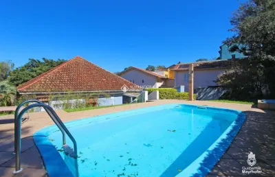 Casa em condomínio fechado com 3 quartos à venda na rua dos minuanos, 308, espírito santo, porto alegre, 181 m2 por r$ 850.000
