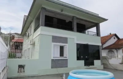 Casa com 5 quartos à venda na rua oscar tollens, 98, santa tereza, porto alegre, 400 m2 por r$ 750.000