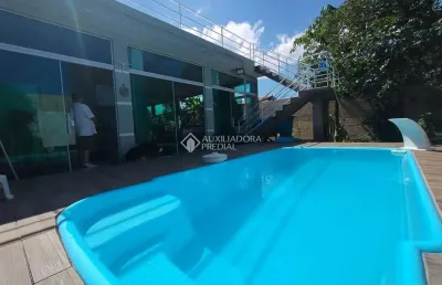 Casa com 4 quartos à venda na rua sagrada familia, 183, pinheira, palhoça, 183 m2 por r$ 1.700.000