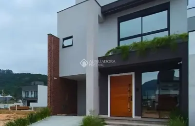 Casa em condomínio fechado com 3 quartos à venda na avenida deltaville, 301, beira rio, biguaçu, 132 m2 por r$ 1.199.000