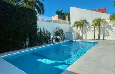 Casa com 5 quartos à venda em jurerê internacional, florianópolis  por r$ 7.850.000