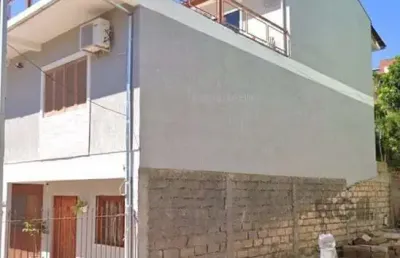 Casa com 4 quartos à venda na Estrada Aracaju, 1145, Vila Nova, Porto Alegre