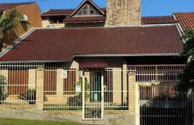 Casa com 4 quartos à venda na Rua Alcebíades Antônio dos Santos, 107, Nonoai, Porto Alegre