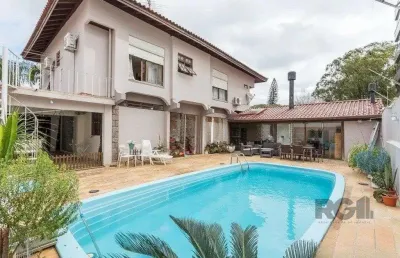 Casa com 3 quartos à venda na Avenida Montreal, 356, Jardim Lindóia, Porto Alegre