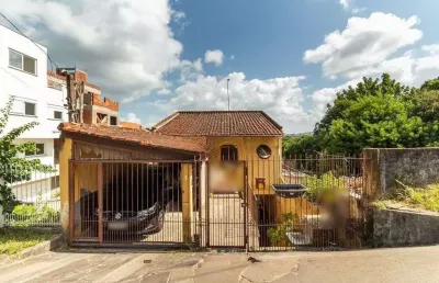 Casa com 4 quartos à venda na Rua Padre João Batista Reus, 2778, Camaquã, Porto Alegre