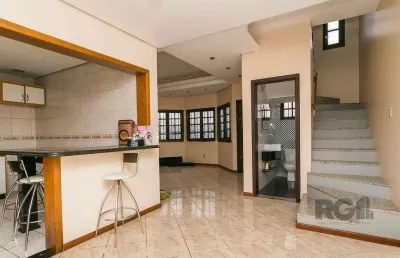Casa com 3 quartos à venda na Rua Tomé Antônio de Souza, 267, Campo Novo, Porto Alegre