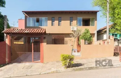 Casa com 4 quartos à venda na Rua Adroaldo Novo Correa, 126, Cavalhada, Porto Alegre