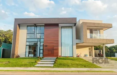 Casa em condomínio 5 dormitórios à venda alphaville porto alegre/rs