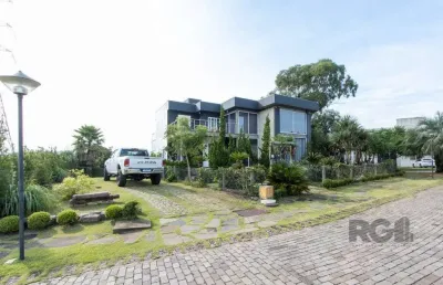 Casa em condomínio 4 dormitórios à venda vila nova porto alegre/rs