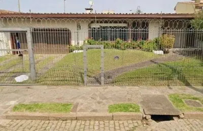 Casa com 4 quartos à venda na Rua Jacipuia, 201, Guarujá, Porto Alegre