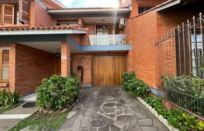 Casa com 4 quartos à venda na Rua Adão Pinheiro da Silva, 90, Ipanema, Porto Alegre