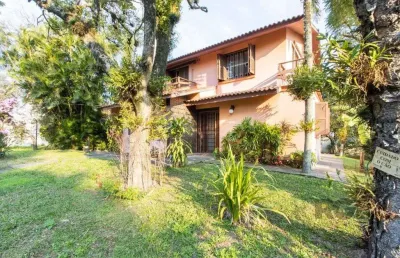 Casa com 4 quartos à venda na Rua Itapitocaí, 725, Cristal, Porto Alegre