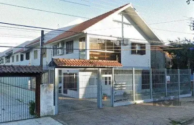 Casa em condomínio 3 dormitórios à venda vila nova porto alegre/rs