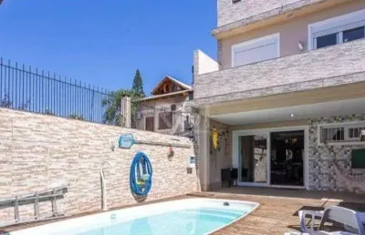 Casa com 3 quartos à venda na Rua Pasteur, 639, Ipanema, Porto Alegre