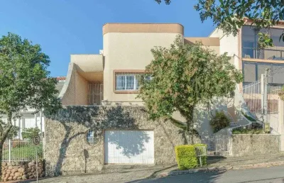 Casa com 4 quartos à venda na Rua Fernando Osório, 440, Teresópolis, Porto Alegre